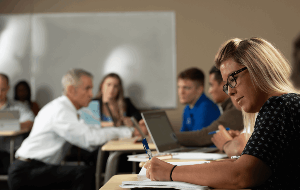 Students in classroom setting with instructor